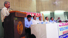 A speaker delivers a speech during a seminar on Sunday.