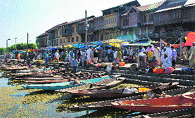 Boats moored to the banks of the Dal Lake in Srinagar.