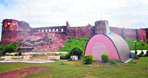 A damaged wall of the Bahu Fort in Jammu.