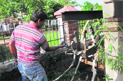 A lineman repairs a damaged transformer in Jammu. 