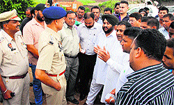 BSP holds a protest outside Rama Mandi police station against the implication of a Dalit in a murder case in Jalandhar on Sunday