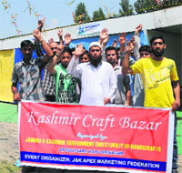 Artisans protest against the Handicrafts Department and the exhibition organiser, Apex Marketing Federation, for providing inadequate facilities in Srinagar on Sunday
