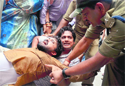 The police arrests VHP activists at the Lucknow airport on Sunday.