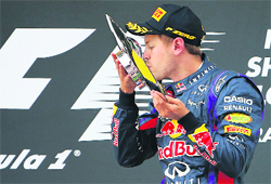 Sebastian Vettel celebrates after winning the Belgian F1 Grand Prix at Spa-Francorchamps on Sunday.