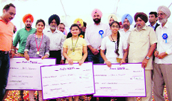 The winners display their prizes at the conclusion of the 14th Punjab State Inter-School Shooting Championship at Mohali Shooting Range on Sunday.