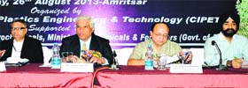 Dignitaries address a seminar on Plastics recyclying and waste management in Amritsar on Sunday