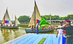 Col A Handa, Group Commander of Chandigarh NCC Group, flags off an NCC sailing expedition at the Sukhna Lake on Monday. A Tribune Photograph