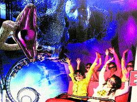 Children enjoying a movie at 7D theatre in Srinagar.