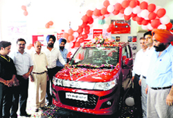 The model of Stingray being launched at Peaks Automobiles in Jammu on Monday. A Tribune photograph 