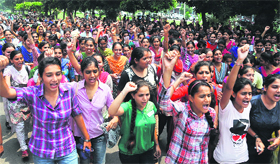 Students of Punjab Agricultural University raise slogans in Ludhiana.