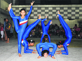 Students perform during the Inter-school District Yoga Championship in Ludhiana.