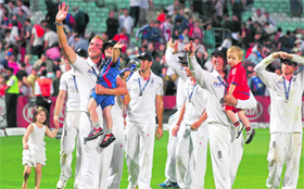 The England team celebrates after the Ashes triumph.