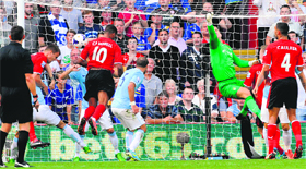 Cardiff Citys Fraizer Campbell (10) scores a goal during their English Premier League match against Manchester City at Cardiff City Stadium in Cardiff on Sunday.