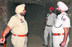 SSP Ravcharan Singh Brar (left) at the spot in the Industrial Growth Centre where illegal mining was carried out. Photo: Bhupinder Dhillon