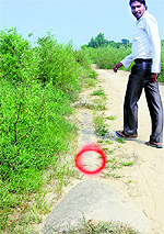 An exposed portion of the Kajauli Waterworks pipeline at Sakhon Majra village on the Bassi Pathana road