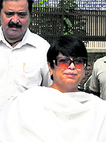 Former Justice Nirmal Yadav comes out of a special CBI court in Chandigarh on Tuesday