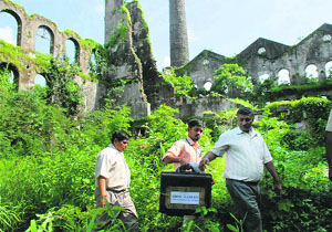 Forensic experts examine the crime scene at Shakti Mills in Mumbai on Tuesday. 