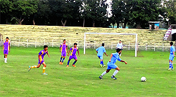 Players in action during the inter-district football championship in Srinagar on Tuesday