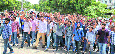 Students protest on Ferozepur Road in Ludhiana on Tuesday