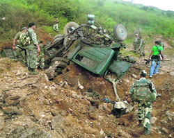 The mangled remains of the BSF vehicle after a landmine blast triggered by Maoists in Koraput district of Odisha on Tuesday. 