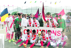 The Sanawar Red team after winning the 16th All India Bhupinder Singh Memorial soccer tournament in Sanawar on Tuesday. Tribune photo 