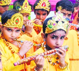 Little Gods: Children dressed up as Lord Krishna celebrate Janmashtami at a temple in Amritsar