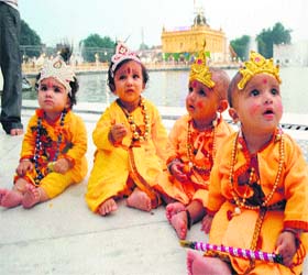 Tiny-tots dressed up as Lord Krishna celebrate Janmashtami at Durgiana Temple in Amritsar