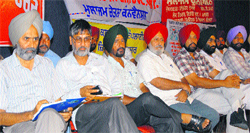 Activists of the Democratic Employees Front (Punjab) in Jalandhar on Wednesday. 