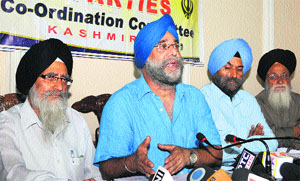 Jagmohan Singh Raina, president of the All Parties Sikh Coordination Committee, addresses mediapersons in Srinagar on Wednesday.