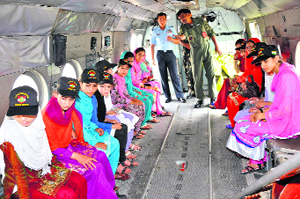 Schoolgirls from the Valley inside an IAF helicopter.
