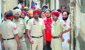 Policemen deployed outside the Division No 3 police station