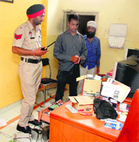 Gaurav Bhakoo shows the ransacked studio in Ludhiana