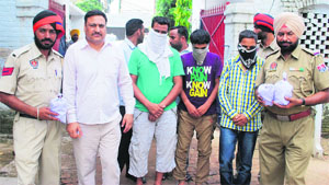 The accused in police custody in Ludhiana on Wednesday. 
