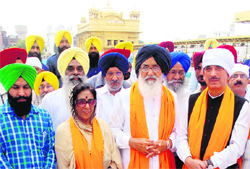 From left: Minister of State For Health Santosh Chaudhary, Chief Minister Parkash Singh Badal and Union Health and Family Welfare Minister Ghulam Nabi Azad at the Golden Temple in Amritsar on Wednesday. Photo: Vishal kumar