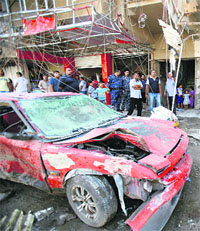 The site of a car bomb attack in Baghdad.