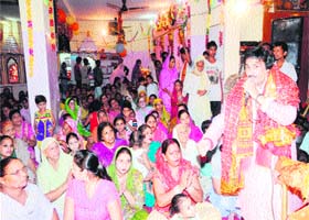 LORDS BIRTH: Rajan Chanchal performs during Janmashtami festival at Shri Durga Mandir at Indra Colony in Amritsar