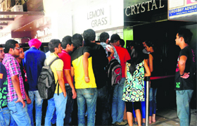 Students queue up outside a discotheque in Sector 26, Chandigarh, for a party organised by PUSU on Thursday.