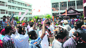 Supporters of a student organisation campaign outside the University Institute of Engineering and Technology
