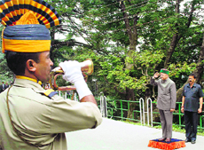 Chief Minister Virbhadra Singh takes the guard of honour at the Vidhan Sabha in Shimla on Thursday.