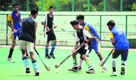 Players in action during the inter-district hockey tournament in Jammu on Thursday.
