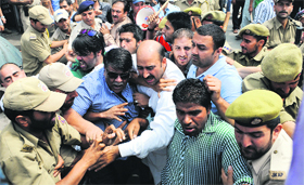 PDP activists protest in Srinagar on Thursday.