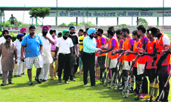 The chief guest being introduced to players at Jarkhar village on Thursday. A tribune photograph 