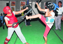 Girls take part in the Martial Art Championship at BVM School in Ludhiana. A Tribune Photograph