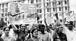 Activists protest against bifurcation of Andhra Pradesh for creation of a separate Telangana state, in Hyderabad