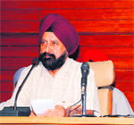 Vice-Chancellor of Guru Nanak Dev University Prof AS Brar addresses members of the Syndicate at a meeting in Amritsar on Friday