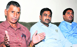 (From left) Members of the State Minority Commission of Punjab, Hamid Masih and Albert Dua, and the president of United Christian Welfare Association George C. Masih. Photo: Bhupinder Dhillon