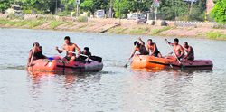 NDRF jawans take part in the swimming-cum-rescue competition at lake No. 3 of the Guru Nanak Dev Thermal Plant in Bathinda on Friday. Photo: Bhupinder Dhillon