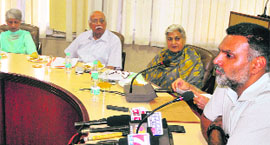 SSP Naunihal Singh interacts with senior citizens at the Police Headquarters in Sector 9, Chandigarh, on Friday. 
