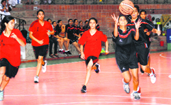 A match of the All-India Basketball Tournament in progress at Welham Girls School in Dehradun on Friday. Tribune photo: Vinod Pundir