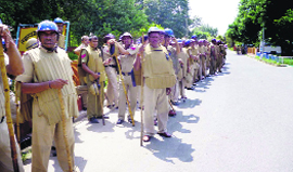 Policemen deployed outside the Civil Hospital in Jind on Friday.
